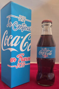 Bouteille en verre pour les 100 ans de Coca-Cola en France (bleue)